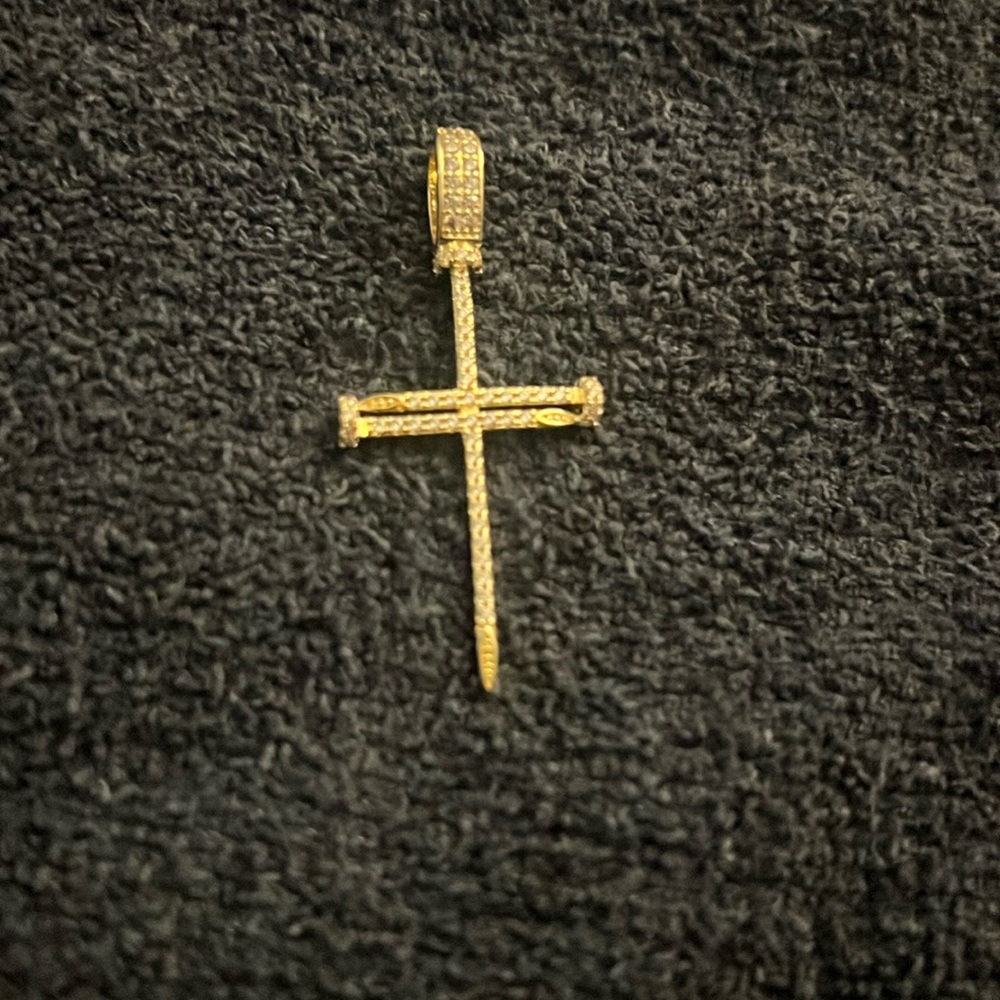 GLD iced out nail cross pendant